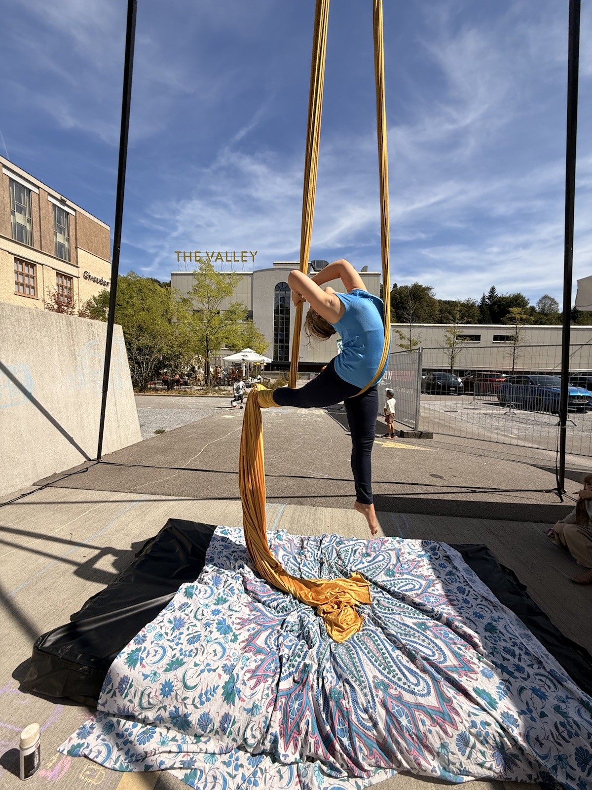 Mathilde upside down on aerial silks